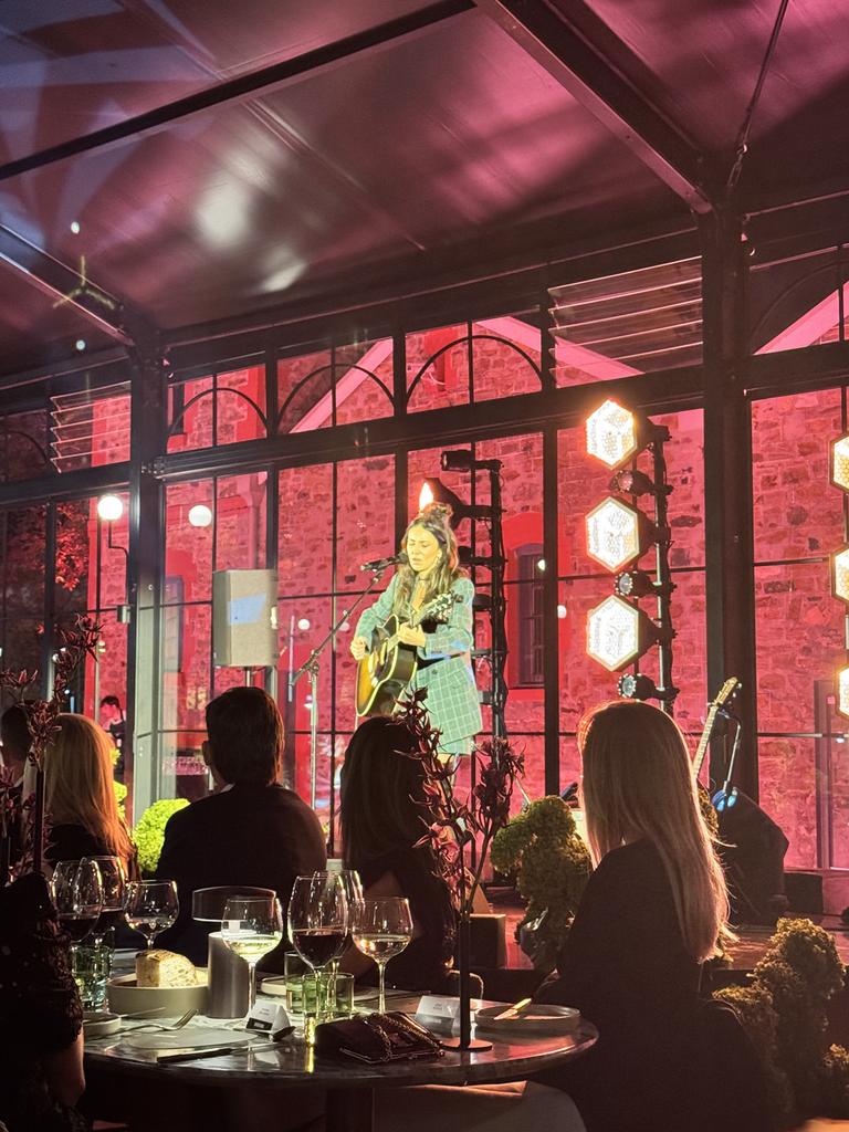 Amy Shark performs at the Gather Round dinner