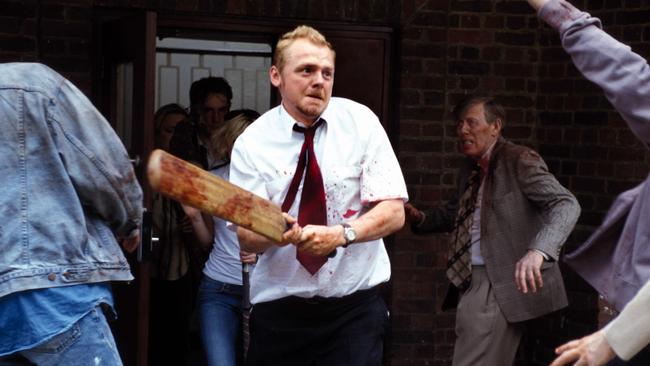 Simon Pegg wields a bloodied bat in the 2004 zombie comedy <i>Shaun of the Dead</i>.