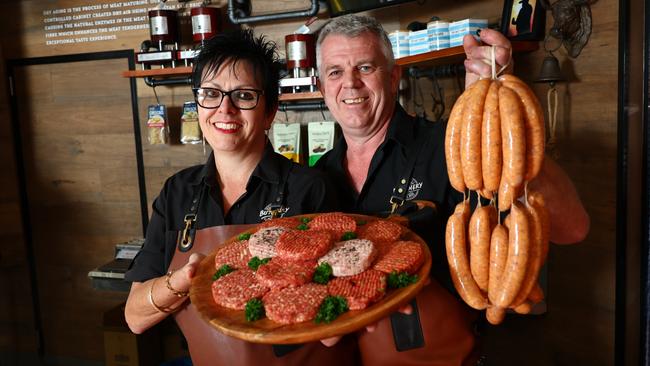 Edge Hill Butchery has won four awards at the Australian Meat Council's Regional Sausage King competition for Far North Queensland. Edge Hill Butchery co owners Julie and Rod Leaver show off some of the sausages, and beef burger patties, that won them the awards.