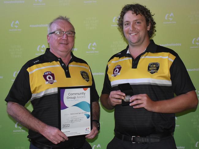 Ben Faulkner and Ashley Ryan accepting the Community Group Award on behalf of Bakers Creek Tigers AFL Club at the Mackay Australia Day awards at the MECC on January 25, 2022. Picture: Lillian Watkins