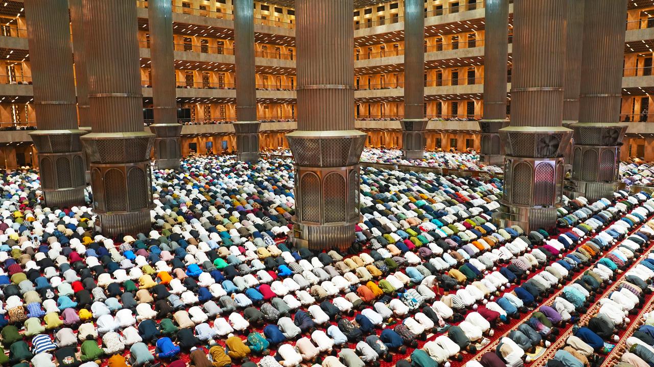 Worshippers observe the first Taraweeh prayers of Ramadan at the Istiqlal Mosque in Jakarta, Indonesia. Picture: Dimas Ardian/Bloomberg via Getty Images