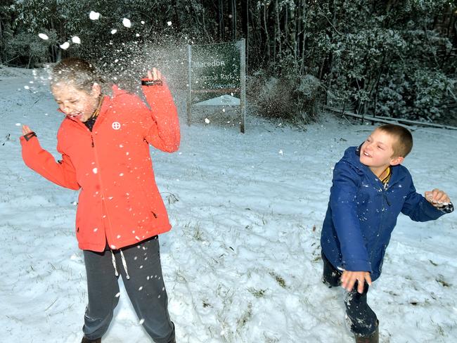 Snow at Mt.Macedon. Mia (12) and Kade (9) Lucas from Macedon have a snow fight. Picture: Jay Town