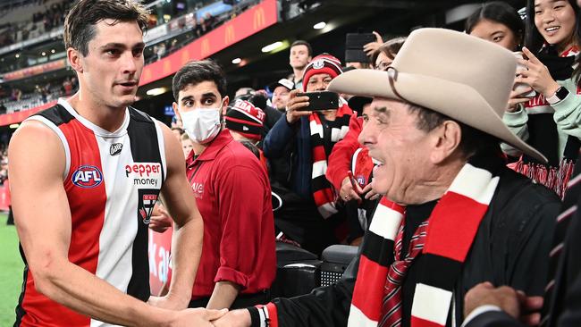 Jack Steele shakes hands with Molly Meldrum. (Photo by Quinn Rooney/Getty Images)