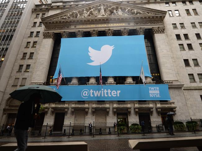 (FILES) This file photo taken on November 7, 2013 shows a banner with the logo of Twitter on the front of the New York Stock Exchange (NYSE) in New York. Major internet services including Twitter and Spotify suffered outages on October 21, 2016 as a US internet provider said it had come under attack.The internet service company Dyn said on its website that it had suffered a denial of service attack shortly after 1100 GMT. / AFP PHOTO / EMMANUEL DUNAND