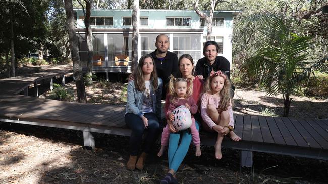 Frustrated residents Sara Skipworth, Eudes Zavarce, Patrizia Schenone with daughters Elayna 2 and Nicole 7, and Daniel Gonzalez. Picture: Glenn Hampson