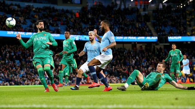 Raheem Sterling scores the first of his three goals against Watford. Picture: Getty Images