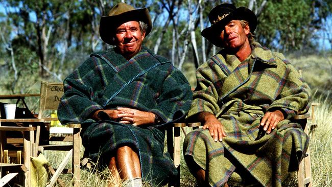 John Meillon and Paul Hogan on the set of Crocodile Dundee.