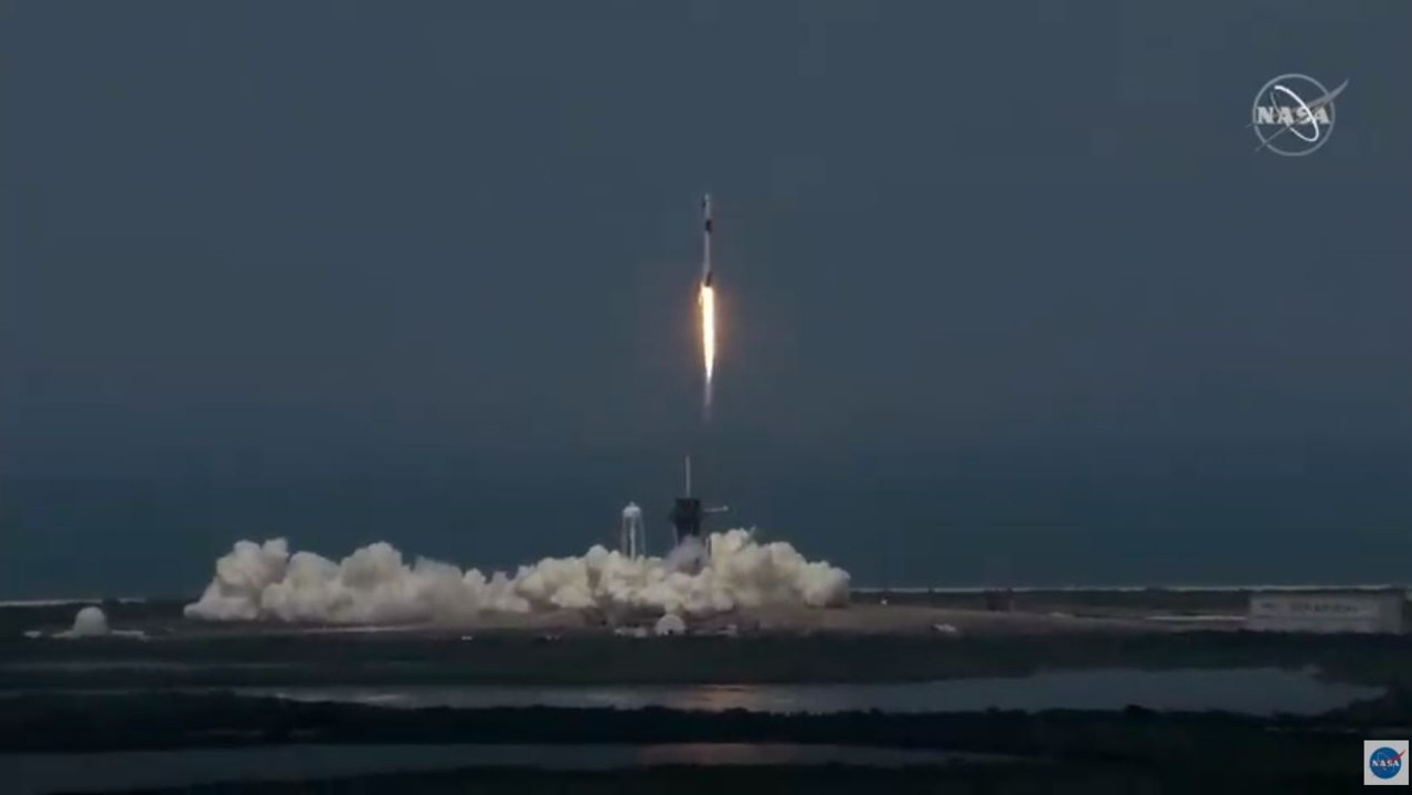 The Falcon 9 rocket carrying the Crew Dragon capsule with NASA astronauts Robert Behnken and Douglas Hurley on board.