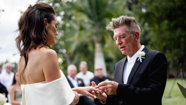 Wayne Cooper and Elizabeth Adams tie the knot at their Byron Bay home on December 1