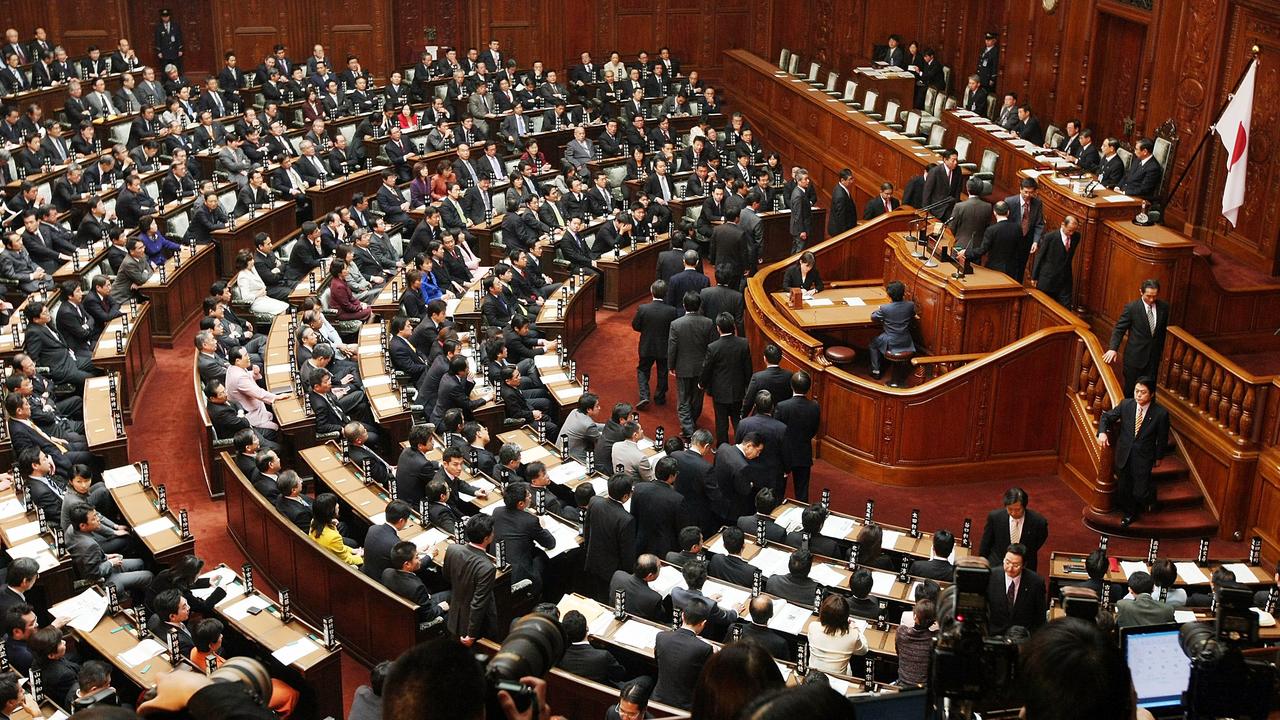 Upper house members vote during the full assembly. Picture: Junko Kimura/Getty Images