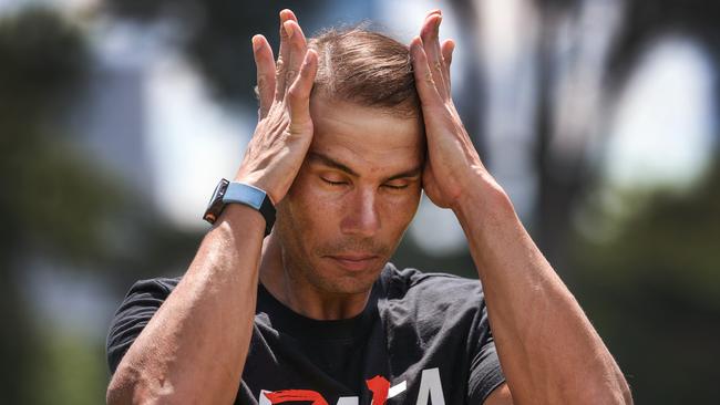 Australian Open Mens Tennis champion Rafael Nadal feels the heat at Government House lawn, in Melbourne. Picture: David Caird