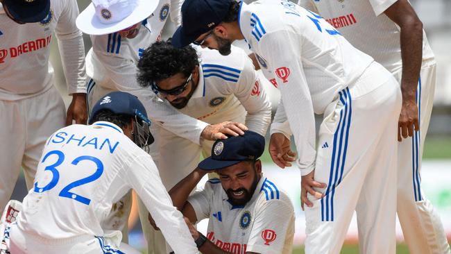 The stripes on India’s Test cricket kit are hard to miss. (Photo by Randy Brooks / AFP)