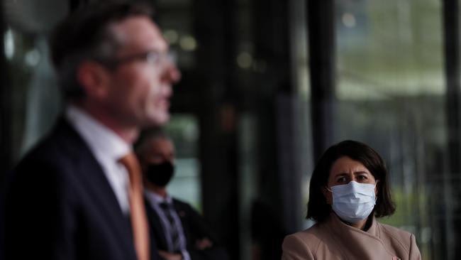 Mr Perrottet speaks at a press conference as Ms Berejiklian looks on. Picture: NCA NewsWire / Nikki Short