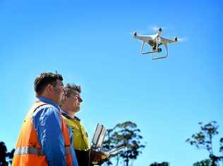 EYE IN THE SKY: Water and Waste Water inspector Joe Morrissey with plant operator Blake Brewer-Charles and the new Lismore City Council drone to be used to inspect wastewater trunk mains and overflow. Picture: Marc Stapelberg