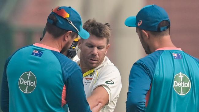 David Warner was sidelined when the Aussies went out to field. Picture: AFP