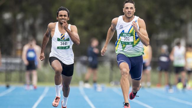 Mingara’s Joshua Ross (R) in action during the Men 100m Sprint Open heats at the Athletics NSW All Comers meet at Mingara Regional Athletics Track on January 11. Picture: Troy Snook