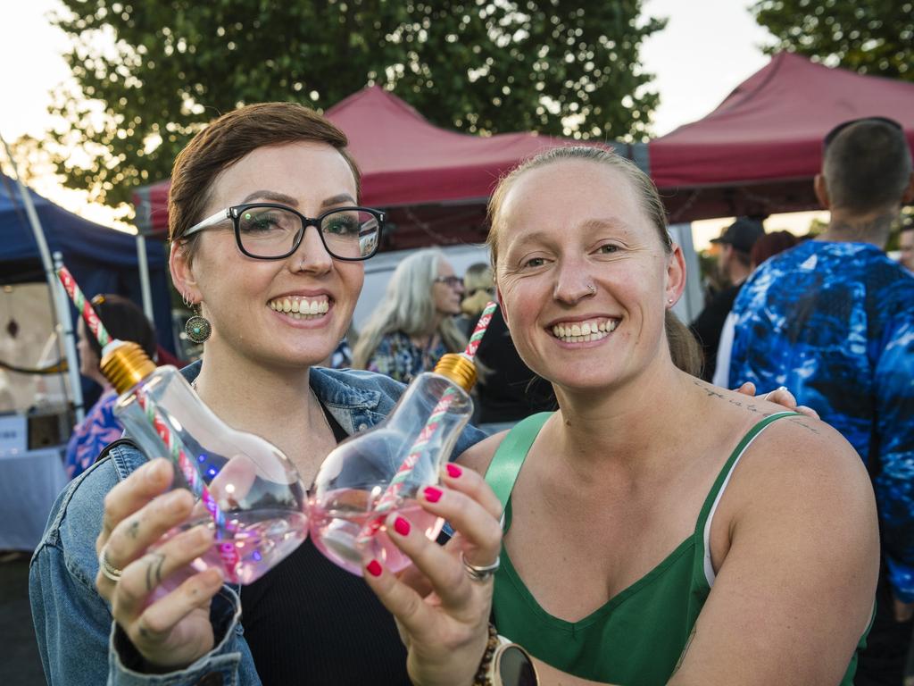 Harmony Greet (left) and Tabitha Turner enjoy light bulb lemonades at Twilight Eats at the Windmills, Saturday, November 18, 2023. Picture: Kevin Farmer