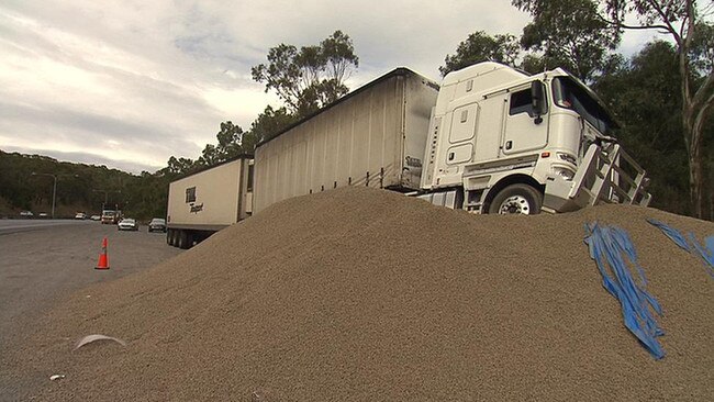 A quick-thinking truckie avoided peak-hour disaster on the South-Eastern Freeway in May after he was forced to make emergency stop, veering off the freeway and into a pile of gravel near the Heysen Tunnels. Picture: 7 News Adelaide