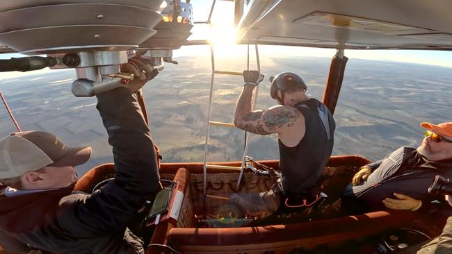 10,000ft and clinging to a ladder: Man’s death-defying lust for life