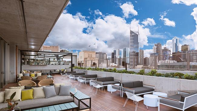 QT rooftop bar for sleek and stunning drinks and good times.