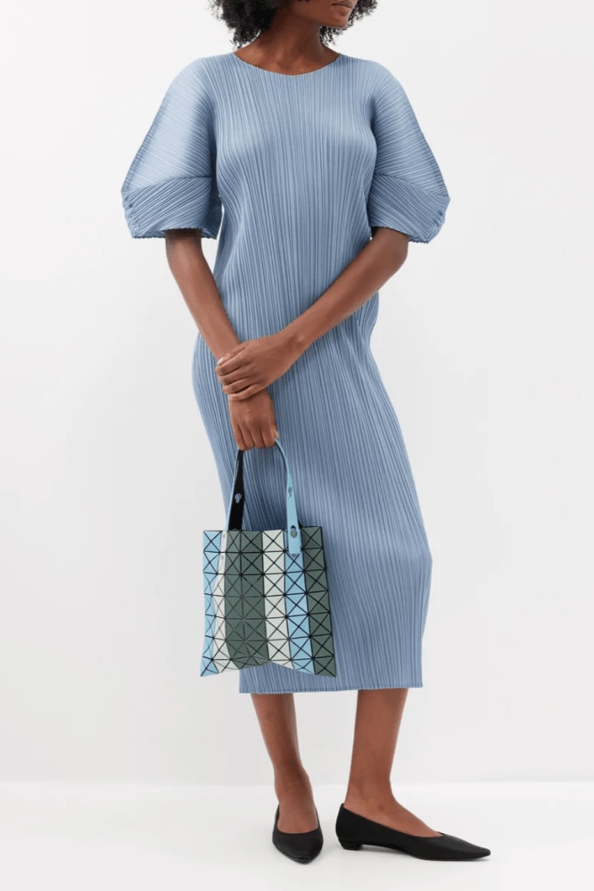 <h3><a href="https://www.matchesfashion.com/au/womens/designers/pleats-please-issey-miyake" target="_blank" rel="nofollow noopener">Pleats Please Issey Miyake</a></h3><p>Have room to splurge on your <span>wedding attire</span>? Why not add this absurdly comfortable Issey Miyake dress to your cart. Wear with your hair down and a pair of kitten heels; every wedding needs a dose of too-cool-for-school, art curator energy, and you&rsquo;ll bring it in spades.</p><p><b>Length:</b> Midi |<b> Material:</b> Polyester | <b>Delivery: </b>Free over $800</p><p><b>SHOP NOW: </b>Pleats Please Issey Miyake technical-pleated midi dress, $855 from <a href="https://www.matchesfashion.com/au/products/1546026" target="_blank" rel="nofollow noopener"><b>Matches Fashion</b></a></p>