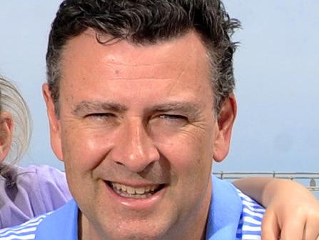Andrew Southcott has been re-elected to the seat of Boothby. Andrew Southcott with his wife Kate and kids Georgina, 9, and Henry, 11, at Brighton Beach.