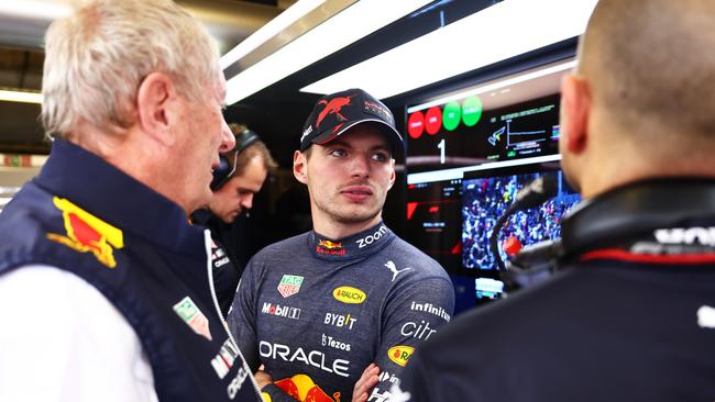 Max Verstappen of the Netherlands and Oracle Red Bull Racing looks on in the garage.