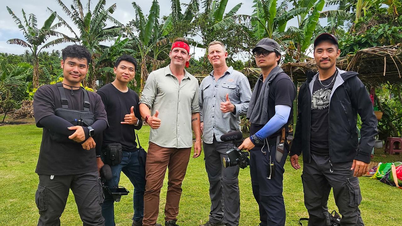 The Best Ever Food Review Show team, producer Dau Xuan Vu, cameraman Dinh Tuan Anh, host Sonny Side, with Travis McCombe from PNG Experience, cameraman Tran Quang Dao, and editor Nguyen Van Qui in Papua New Guinea.