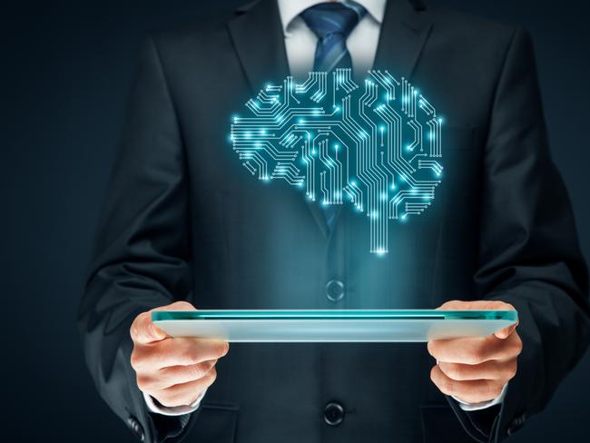 Artificial intelligence (AI), data mining, expert system software, genetic programming, machine learning, deep learning, neural networks and another modern computer technologies concepts. Brain representing artificial intelligence with printed circuit board (PCB) design. Istock