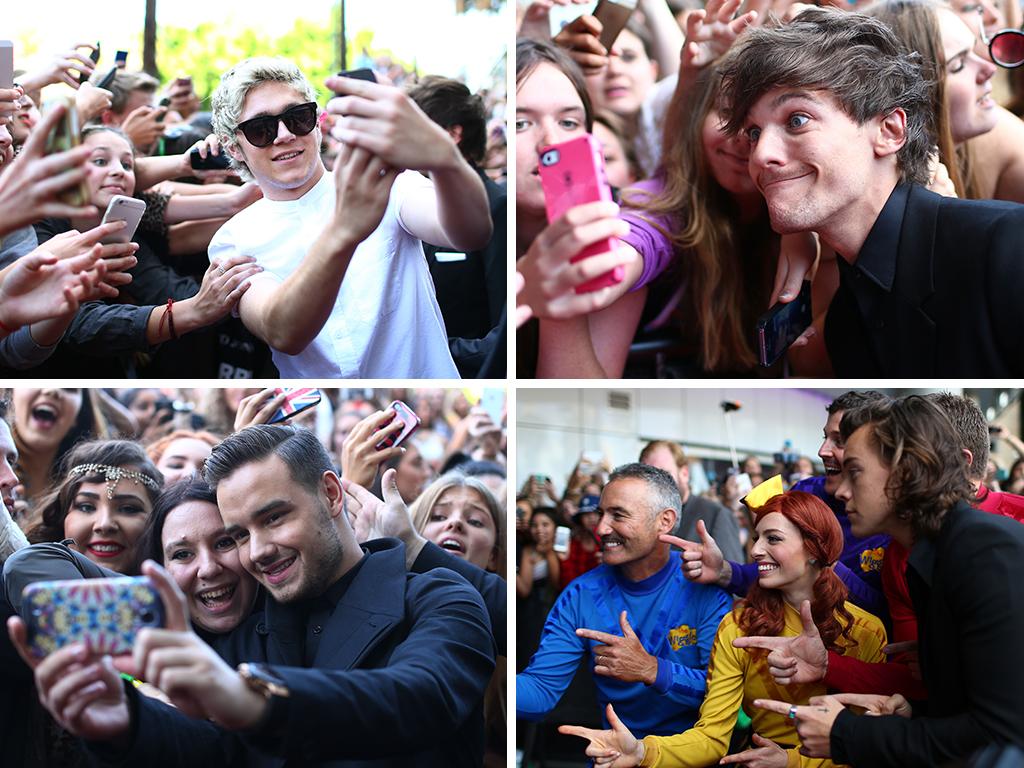 One Direction stars Niall Horan, Liam Payne and Louis Tomlinson take selfies with fans and Harry Styles gets jiggy with The Wiggles at the ARIA Awards 2014 in Sydney Australia. Picture: Getty