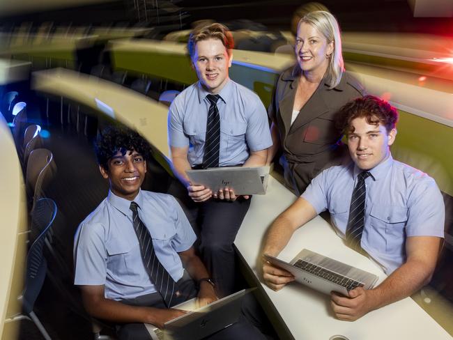 Tanya Nelson (Director of STEAM education) with BBG students Daham Kodithuwakku (17), Morgan Jury (18) and Jonathan Davis (18).Tanya is spearheading the school's new $70m STEAM precinct that contains AI. Picture: Matthew Poon