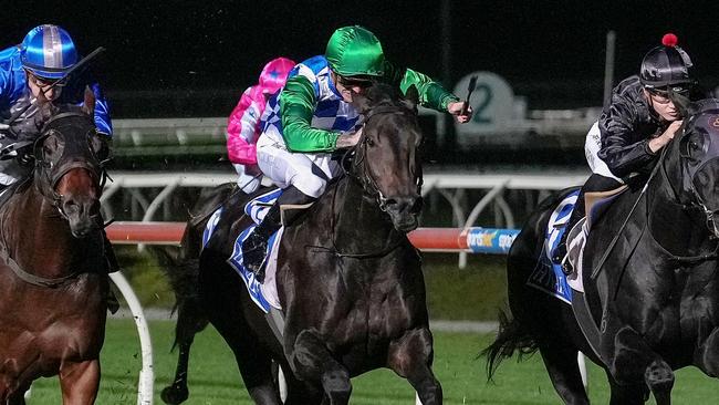 Grid Girl (NZ) ridden by Blaike McDougall wins the Joan Watson BM64 Handicap at Sportsbet Pakenham on April 04, 2024 in Pakenham, Australia. (Photo by George Sal/Racing Photos via Getty Images)