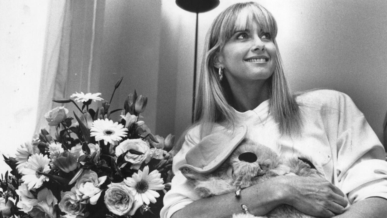 Newton-John launches her first ‘Koala Blue’ store in Australia in 1990. She started the Los Angeles-based business seven years earlier with friend and fellow singer Pat Carroll, originally for Australian imports. The company declared bankruptcy and closed in 1992.