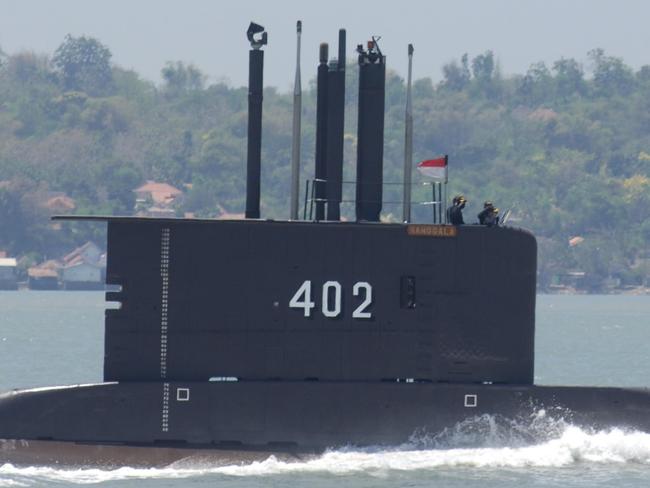 SURABAYA, INDONESIA - SEPTEMBER 25: Indonesia submarine KRI Nanggala-402 perform Sailing Pass during the preparation for the anniversary of Indonesia Military or Tentara Nasional Indonesia (TNI) at Indonesian Navy Eastern Fleet on September 25, 2014 in Surabaya, East Java, Indonesia. TNI anniversary on October 5, 2014 will be held with a massive festive and with all the strength of the main tools of weapons systems of the Indonesia Navy, Indonesia Army and Indonesia Air Force. (Photo by Alex Widojo/Anadolu Agency/Getty Images)