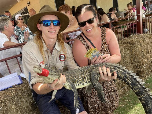 Croc wrangler Payton Prosser and Tracy McMorrow, the winner of the second race with Croc-a-shit at the 2022 Berry Springs croc races. Picture: Glenn Campbell