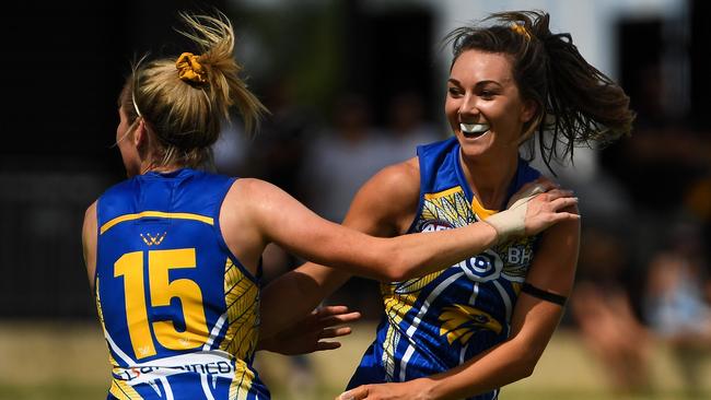 Niamh Kelly and Grace Kelly celebrate an Eagle goal.