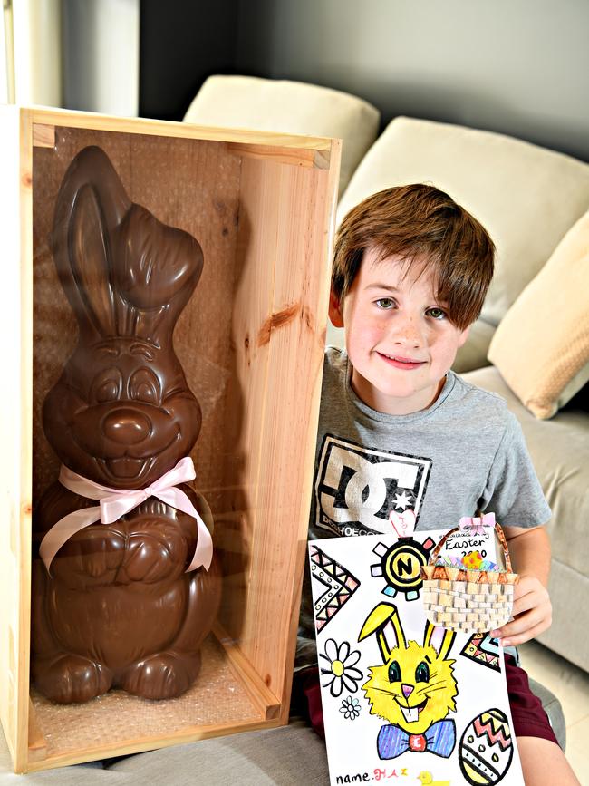 Kai Mason,9, is the lucky winner of a 4kg chocolate bunny from a colouring in competition.