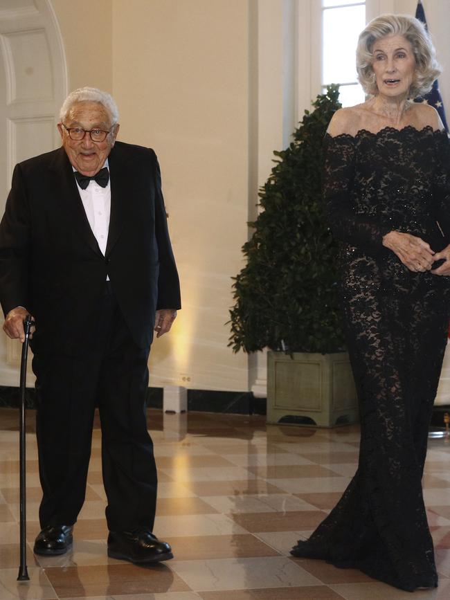 Former Secretary of State Henry Kissinger, left, and wife Nancy Kissinger. Picture: AP