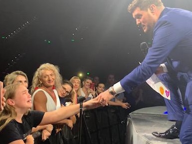 Michael Buble with fan Abby Fellows in Brisbane.