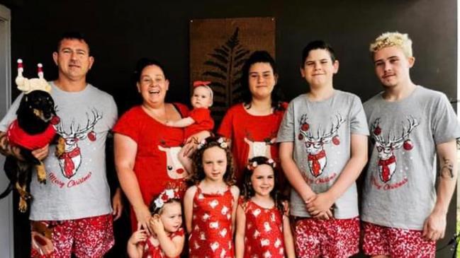 Darren (left) and Charlene Lamb with their seven children. Picture: Supplied