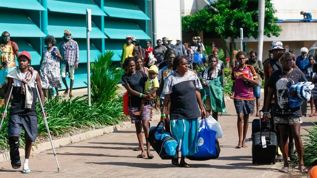 Evacuees from Groote Eylandt after initial processing at Marrara Indoor Stadium. Picture: Glenn Campbell