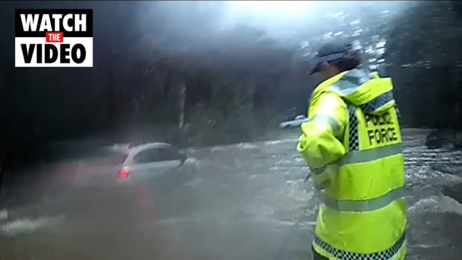 Local officers save 72-year-old woman from flood waters