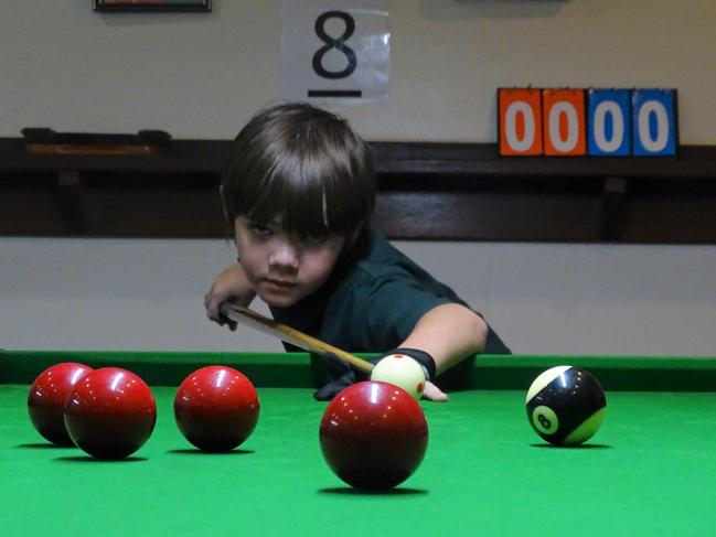 Luke Ha lines up a shot at Tennant Creek 8 Ball. Picture: Anthony Preece