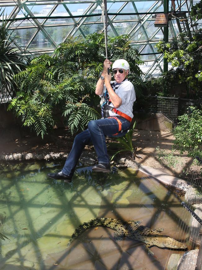 Kennedy MP Bob Katter ziplines over Goliath, the 4m crocodile at Cairns ZOOM and Wildlife Dome. PICTURE: ANNA ROGERS