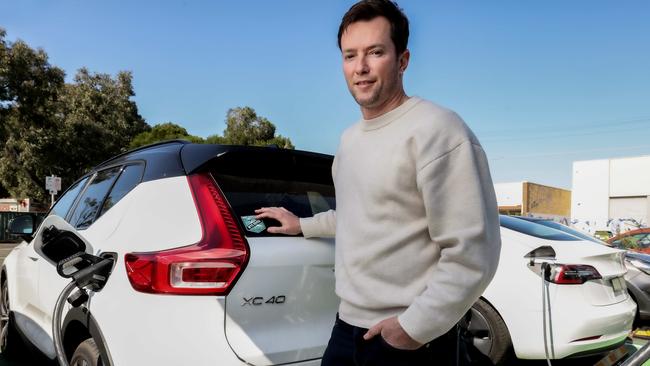 Volvo XC40 owner Scott Druce says he uses a free public charger near his Brunswick home because of the convenience. Picture: Ian Currie