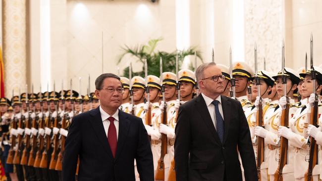 Prime Minister Anthony Albanese invited Chinese Premier Li Qiang (left) to visit Australia during a trip to Beijing in November.