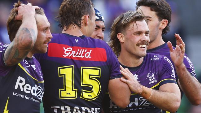 MELBOURNE, AUSTRALIA - MAY 11: Ryan Papenhuyzen of the Storm celebrates with teammates after scoring a try during the round 10 NRL match between Melbourne Storm and Wests Tigers at AAMI Park, on May 11, 2025, in Melbourne, Australia. (Photo by Mike Owen/Getty Images)