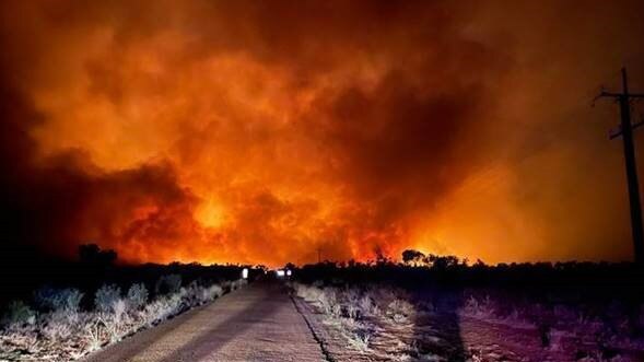 A bushfire that began at Kuraya Outstation burns near Tennant Creek. Picture: Bushfires NT