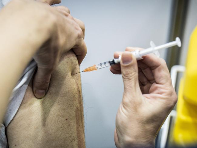 People are urged to get vaccinated. Picture: Tony McDonough/NCA NewsWire