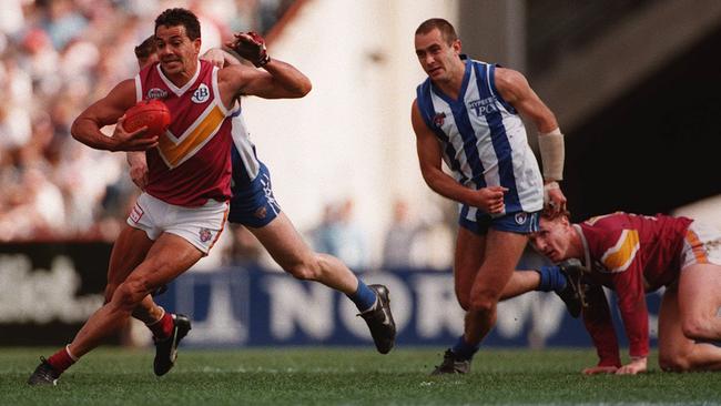 Michael McLean, the man they called ‘Magic’, on the burst for Brisbane. And Grey Morris’ choice as captain of the NT’s ‘greatest’ AFL side